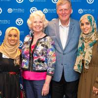 tom and marcia with a group of four women